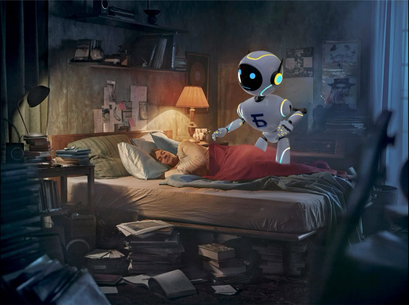 A person sleeping in a cluttered room with a small robot hovering nearby.